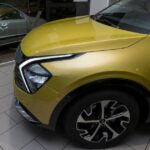coche kia amarillo de lado- autos marrero